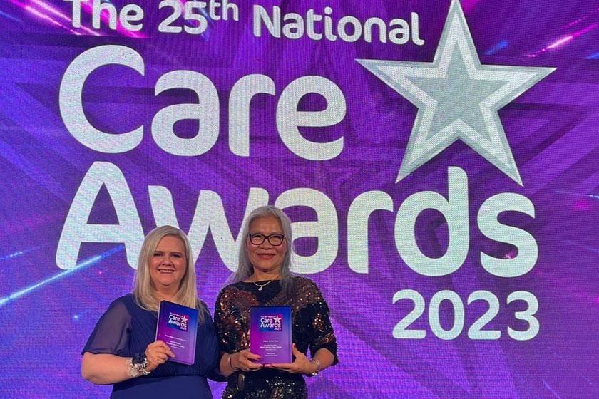 Two Sanctuary Care colleagues with awards at the National Care Awards 2023.