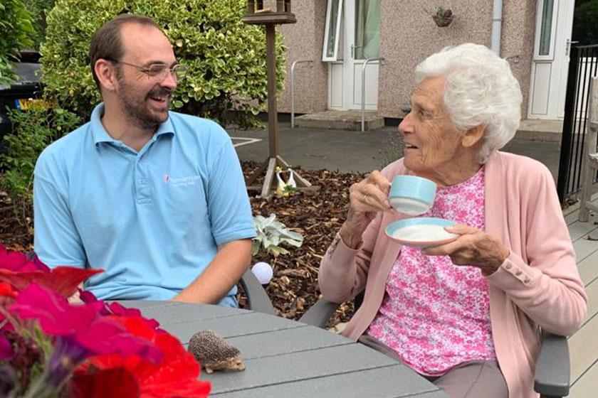Staff member Josh Morrisey and resident Eveline Oliver at Furzehatt Residential and Nursing Home in Plymouth 