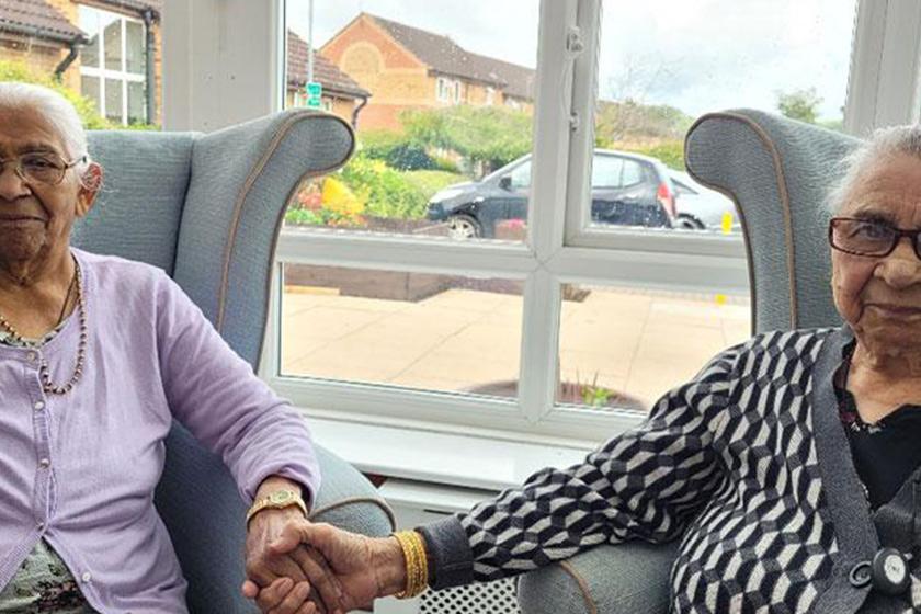 Kashiben and Kamuben, lifelong friends, at Asra House Residential Care Home in Leicester 