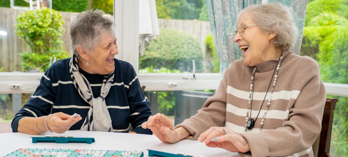 Haven - Residents enjoy a board game