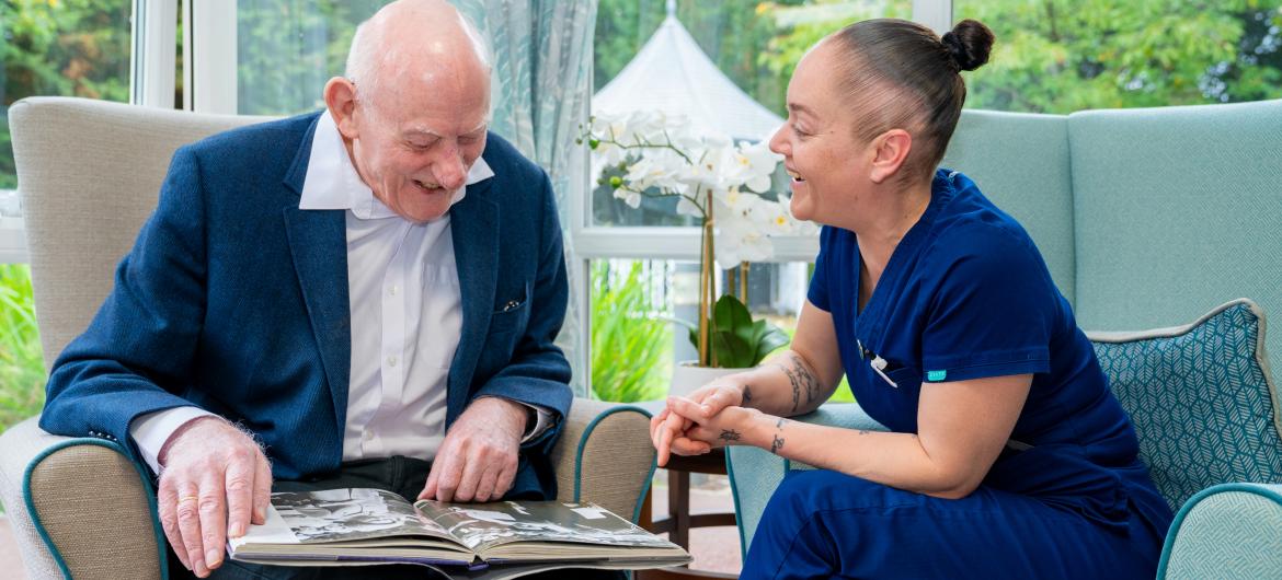 Haven - Resident and carer enjoying a board game