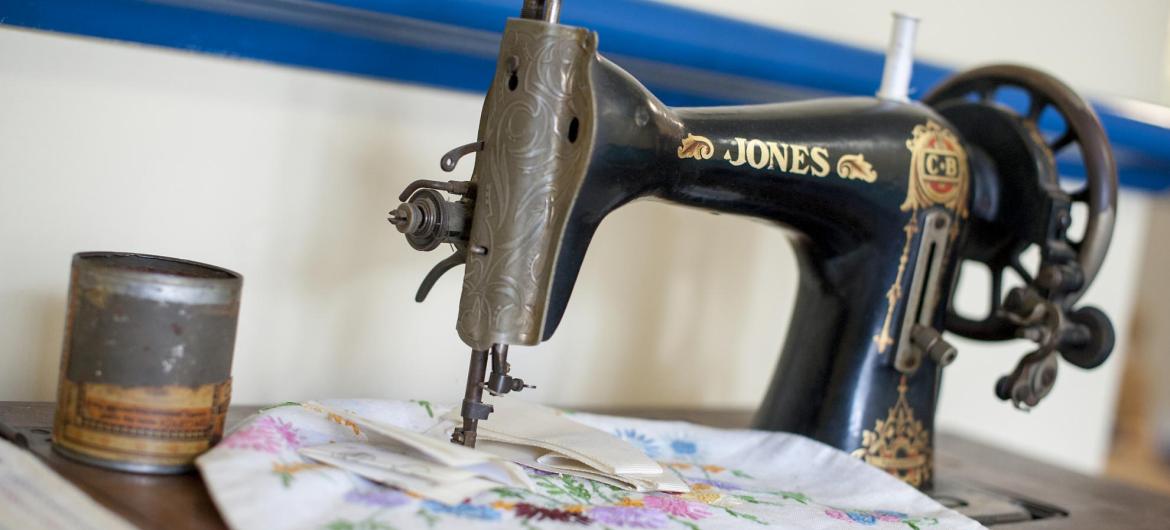A traditional black and gold sewing machine in the activity station at Time Court Residential and Nursing Home.