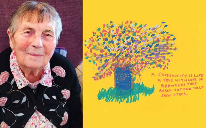 Resident Doreen and the painted tree she created for the communities and belonging project.