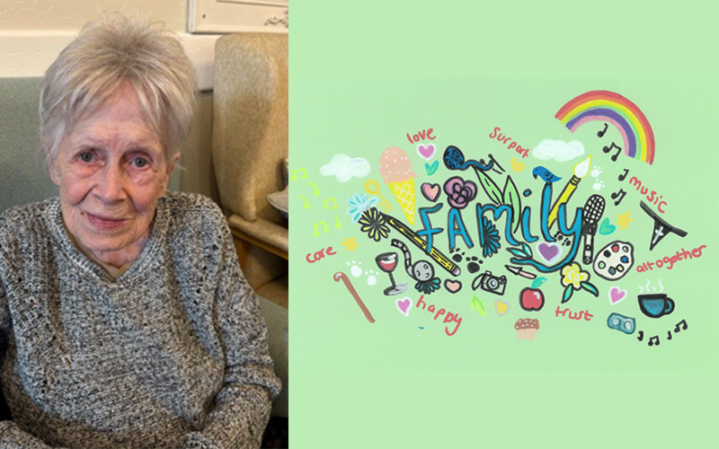 Resident Ricki and the painted tree she created for the communities and belonging project.