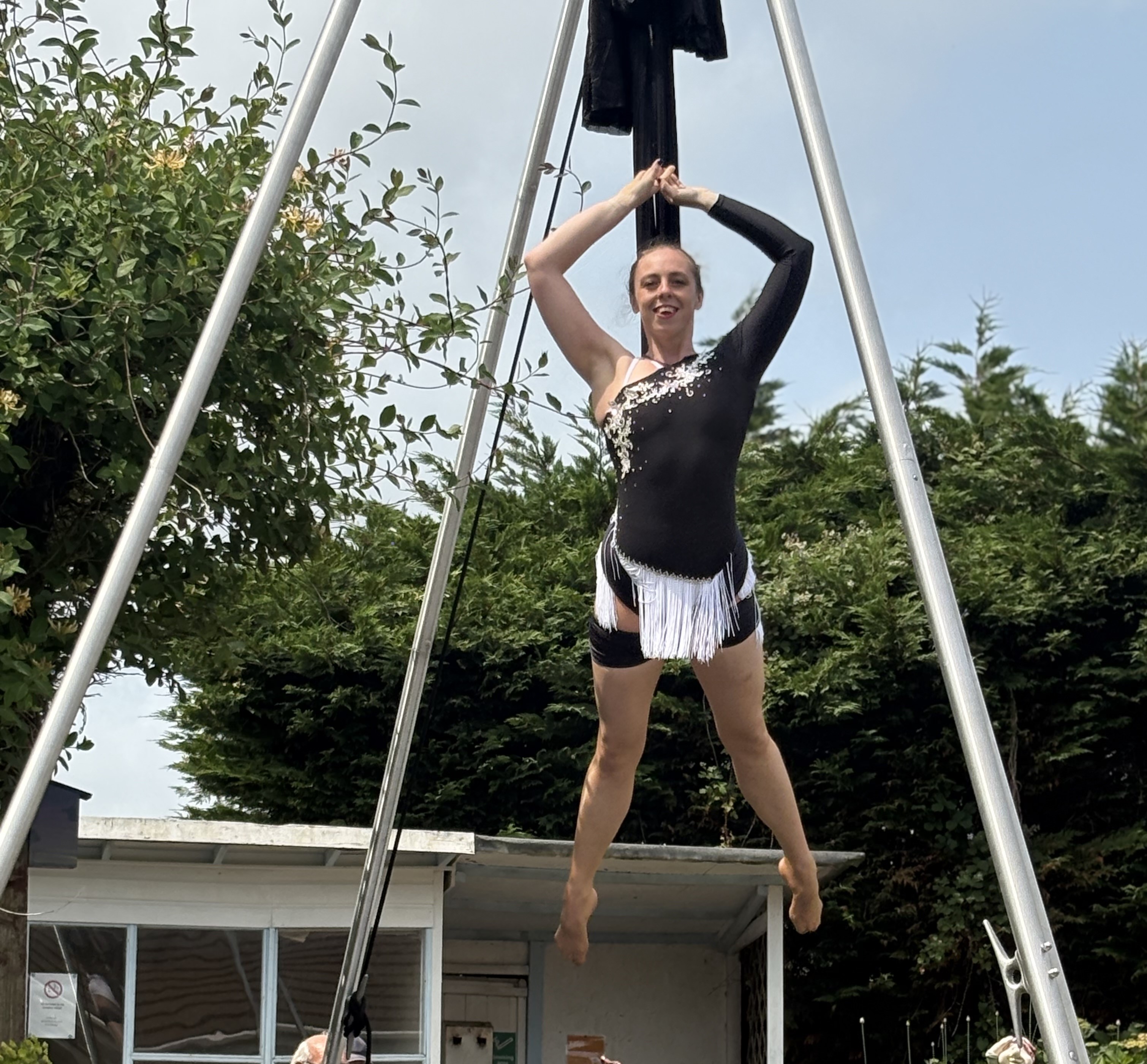 Acrobat Rosie shows off her rope skills to care home residents