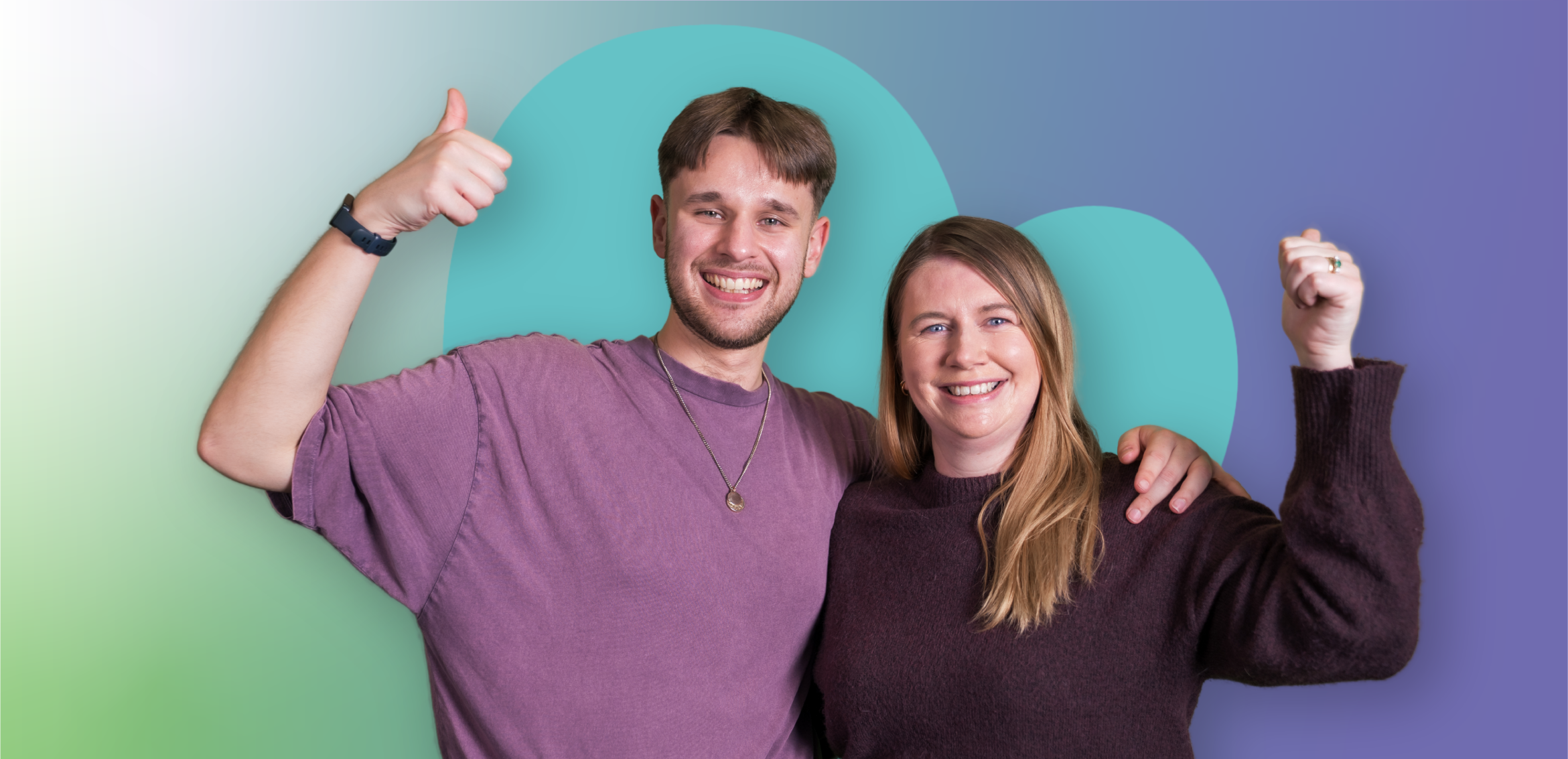 Two people standing side by side with raised thumbs against a green and blue background with large heart shape