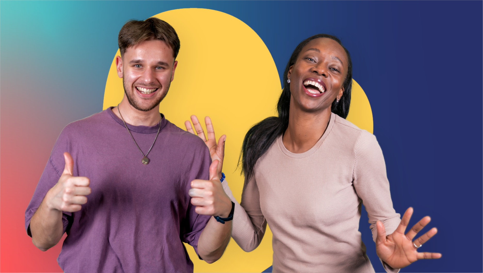 Two people standing in front of a large yellow heart shape on a blue background. One person is giving two thumbs up while the other has their hands raised. Both are looking towards the camera.