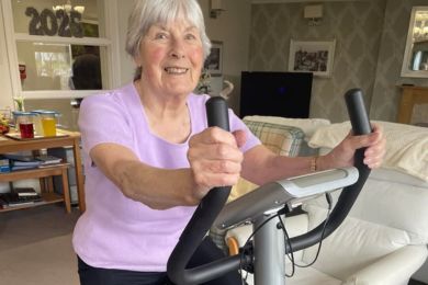 Briggs Lodge resident Mavis cycling on an exercise bike.