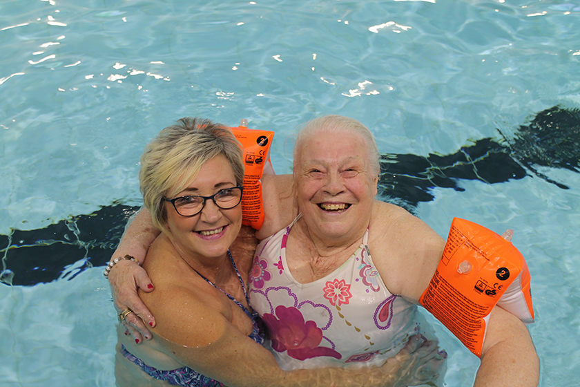 Val Wren with Sanctuary Care staff Karen Turner enjoying the health benefits of swimming