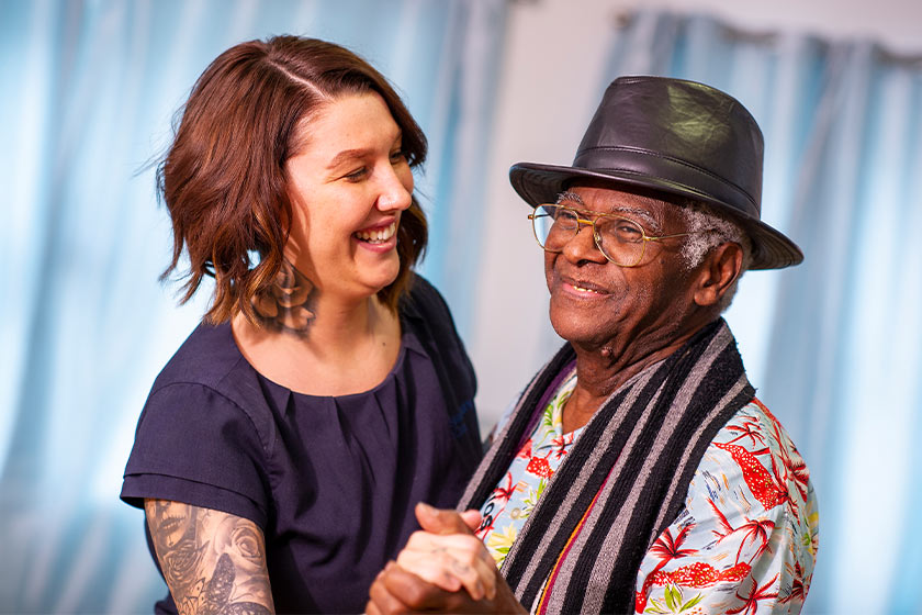 Lime Tree Court manager dancing with resident