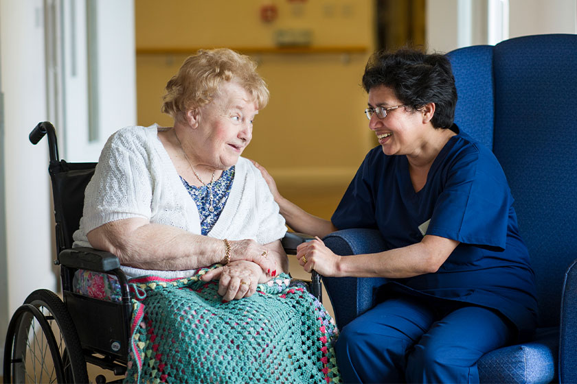 Nursing staff checking on resident