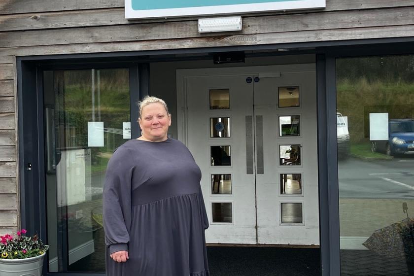 Home Manager Andrea Bacon joins Cedar Grange Woman stands outside of care home smiling
