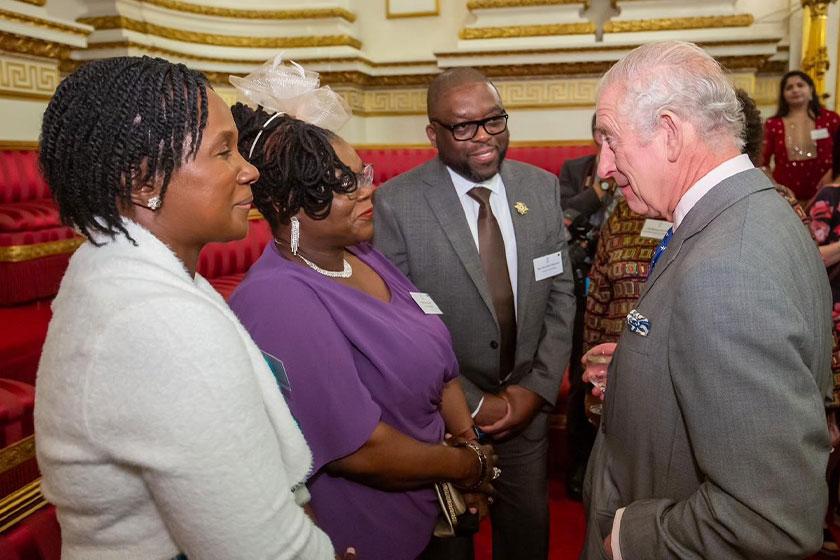 Sanctuary Cares Head of Clinical Development with King Charles at a Buckingham Palace reception