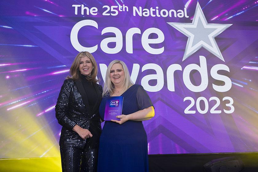 Kirsty, from our Forefaulds Care Home in East Kilbride, accepts her National Care Award from presenter Kate Garroway 
