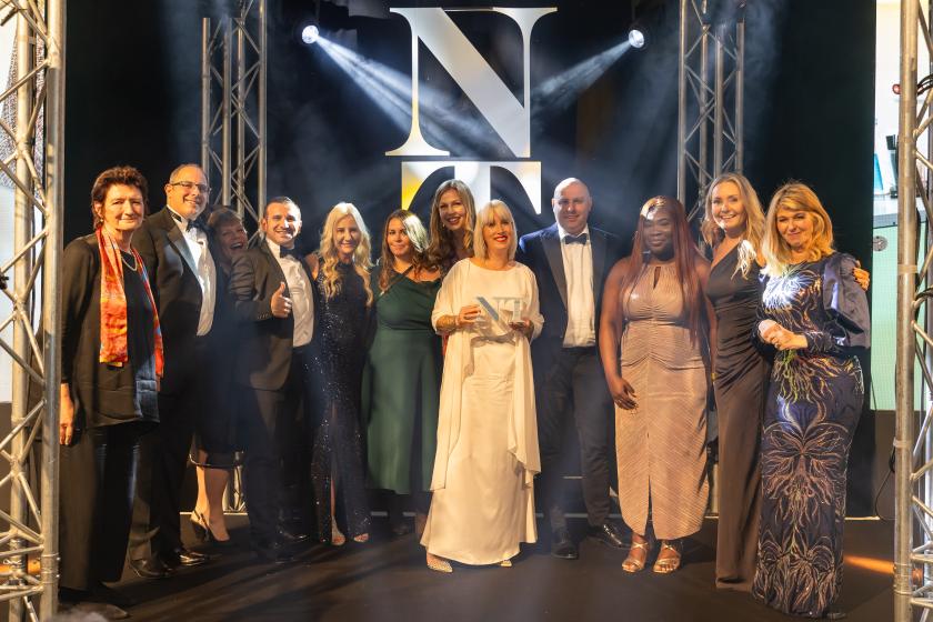 Sanctuary staff smile for the cameras with their Nursing Times Awards