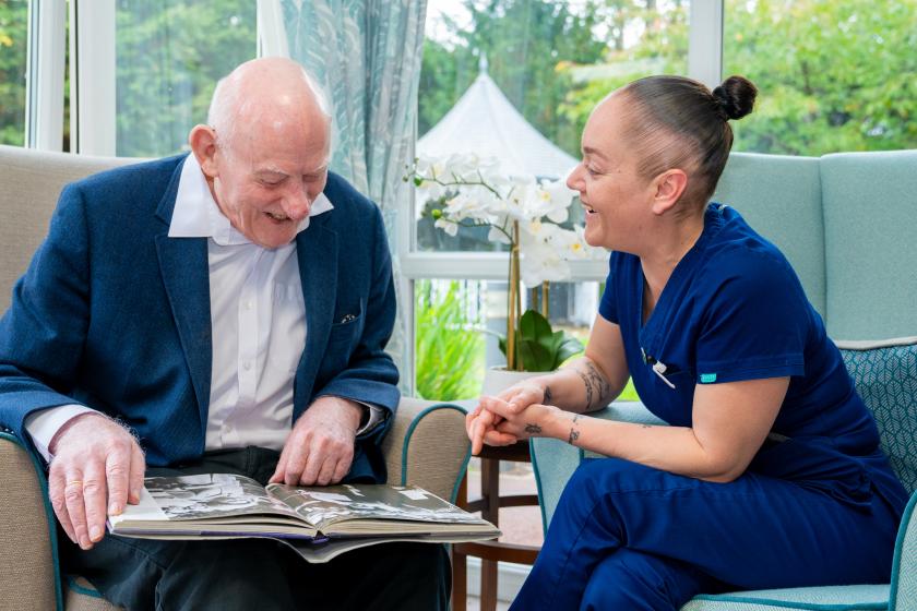 Haven - Resident and carer enjoying a board game
