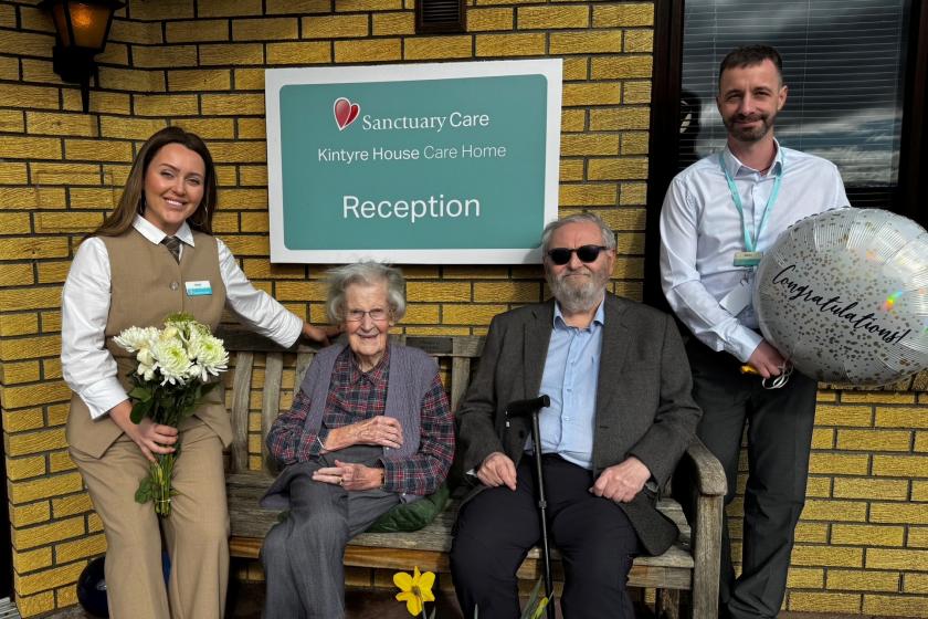Staff and residents together smiling