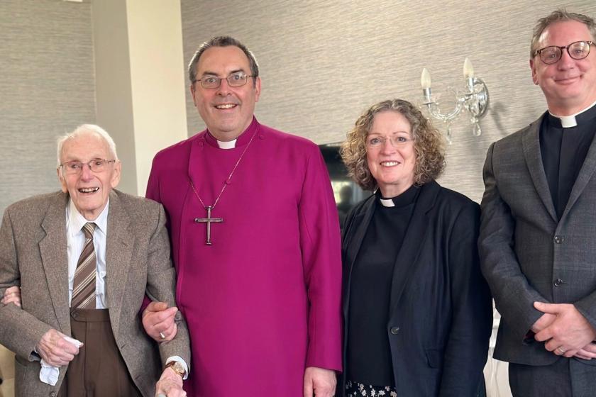 Resident and Reverend Smiling