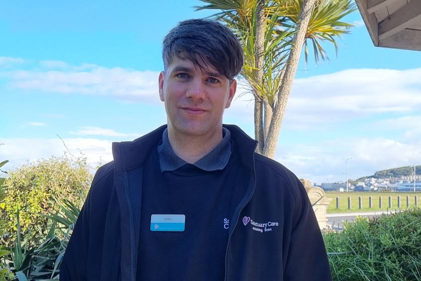 Staff member smiling