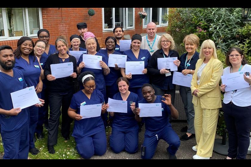 Team celebrating award