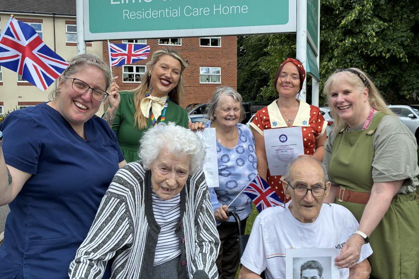 Residents and staff celebrating