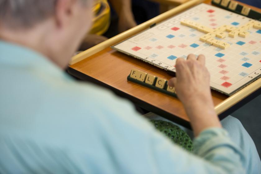 Resident playing scrabble