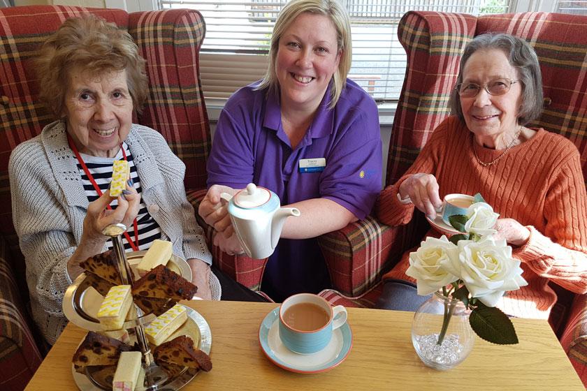 Jenny Hyde, Senior Care Assistant Tracey Sullivan and resident Betty Roe.