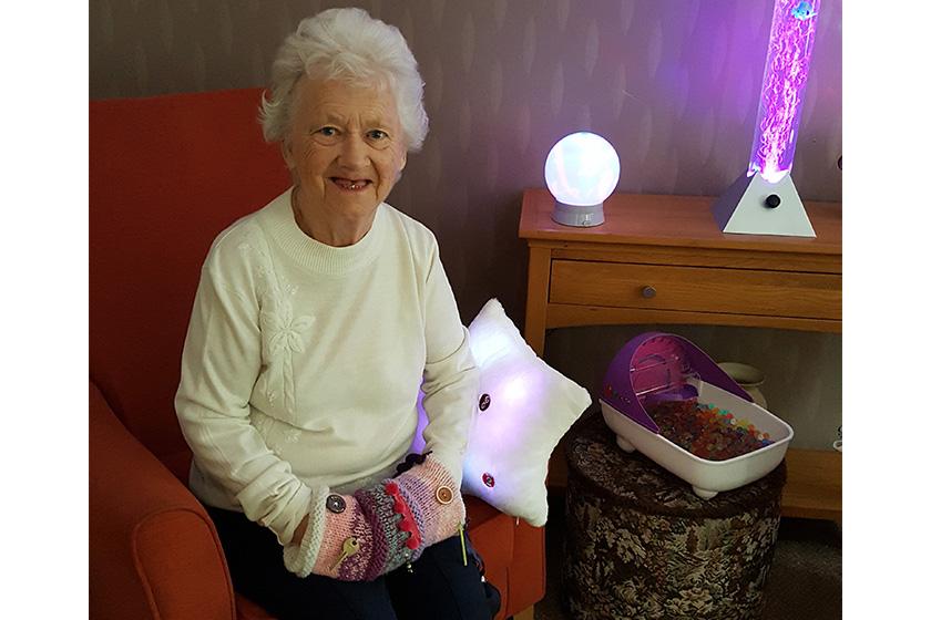 Edna Armitage enjoying the new sensory room.