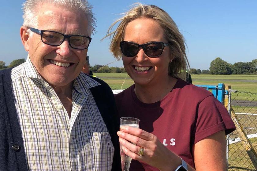 Ravenhurst Care Home resident enjoys a glass of bubbly with his daughter at Halfpenny Green