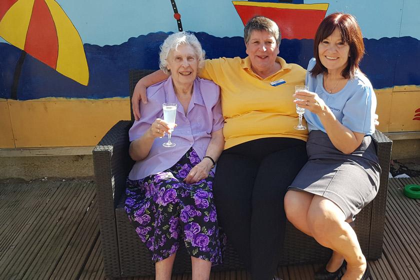Pinewood staff and resident celebrating Lorraine being shortlisted.
