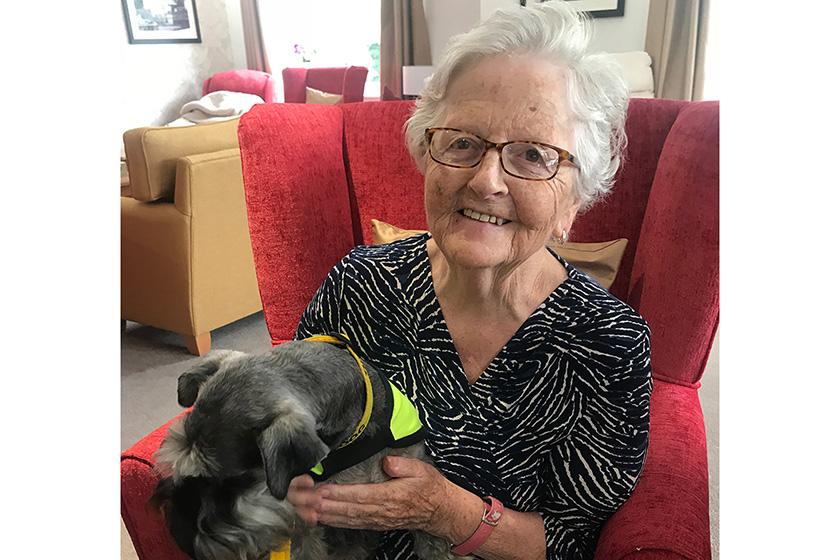 Resident Jean Kostiuk with Bramble the Miniature Schnauzer Resident Jean Kostiuk with Bramble the Miniature Schnauzer