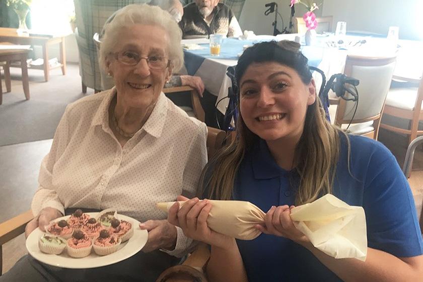 Resident Peggy Cross and Activities Leader Ashlea Kelly Resident Peggy Cross and Activities Leader Ashlea Kelly
