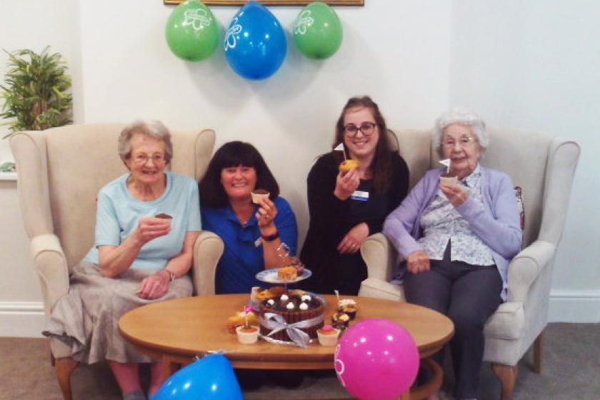 Visitor Briony Corbey, activities leader Suzie Davis, receptionist Sophie Collins and resident June Avery