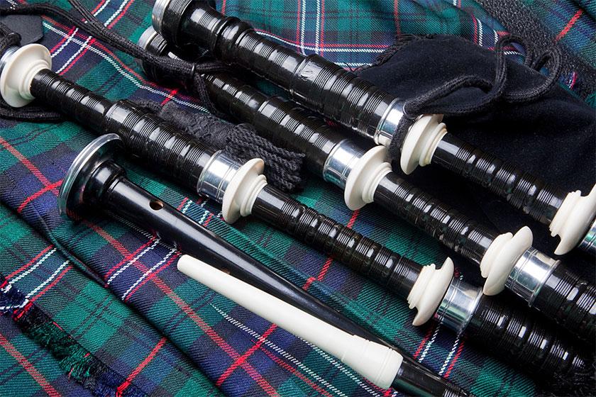 Bagpipes and tartan print.