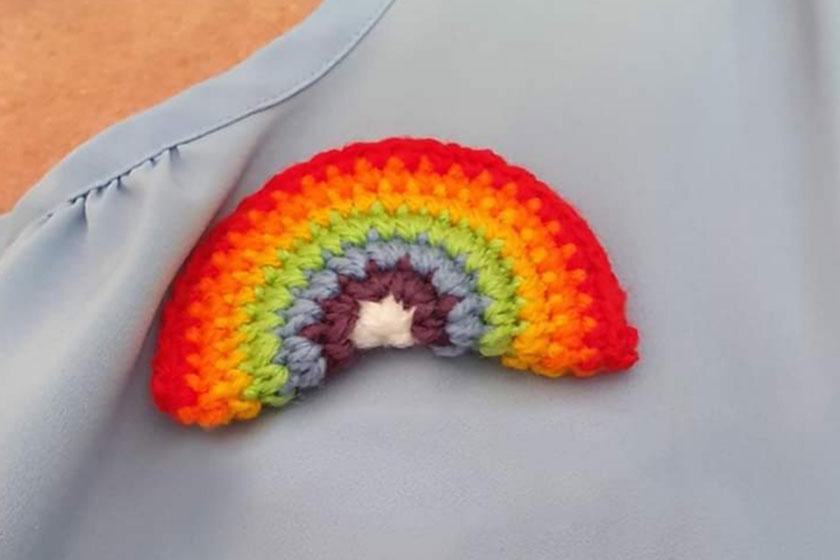 Crocheted rainbow pin from Redhill Court