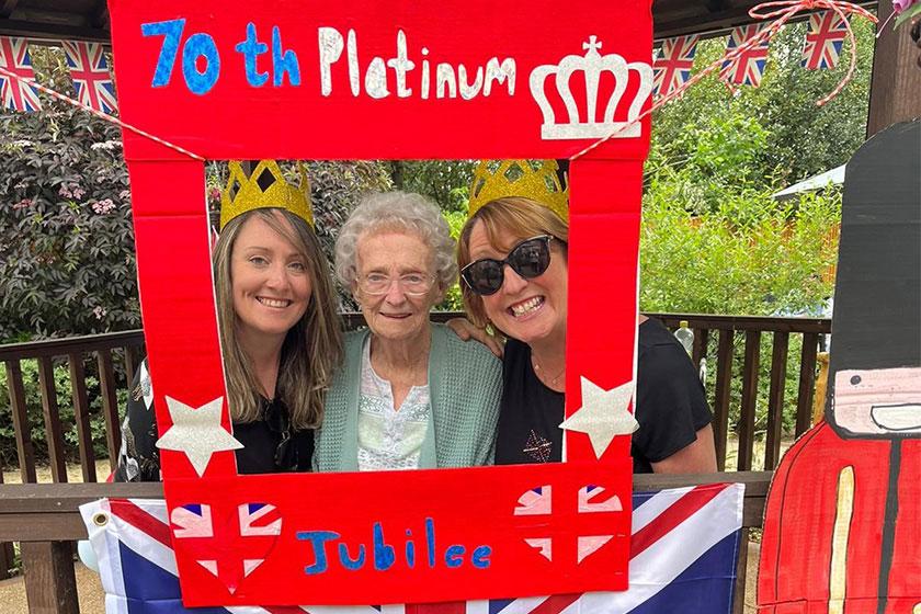 “It’s her home and she’s safe there” – Christine and Betty’s journey Betty and her family at a Jubilee celebration at Upton Dene Residential and Nursing Home in Chester