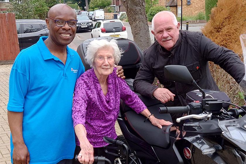 Jill, resident at our Haven Residential Care Home in Pinner, with community biker Patrick and activities coordinator Carl, for a special visit 