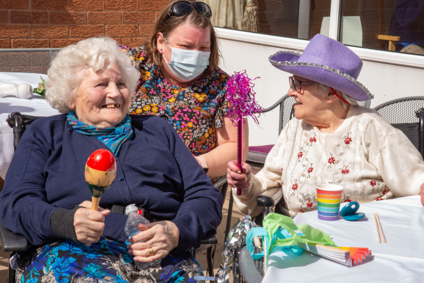 Residents and loved ones enjoy 'Glastonmead' at Westmead Residential Care Home in Droitwich, Worcestershire 