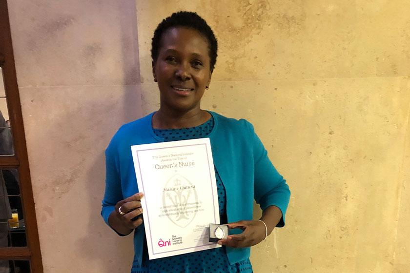 Masline Chitura with her Queen's Nurse accolade 