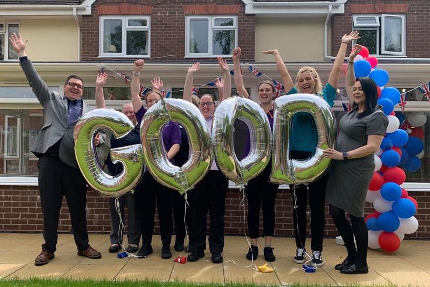 The team at Ivydene Residential and Nursing Home in Ivybridge celebrating a good CQC report 