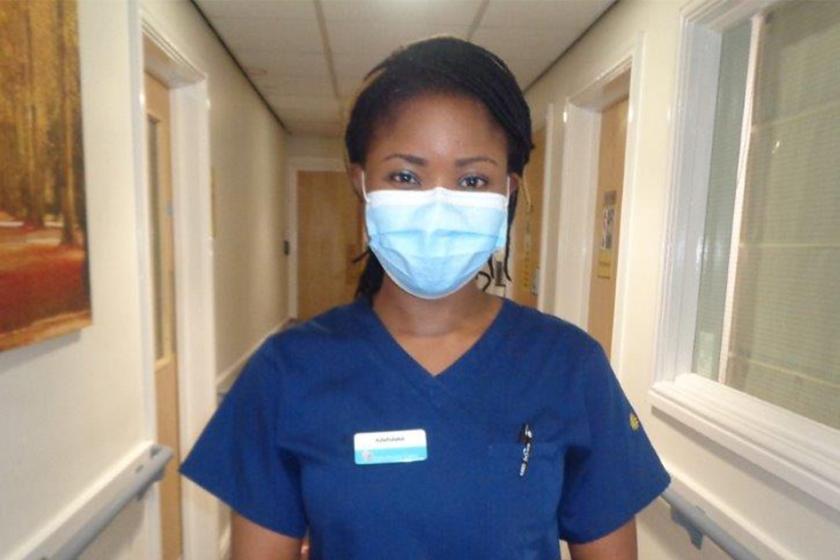 Sanctuary Care nurse Adefolake Olatunde poses for a photograph