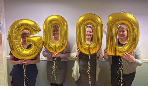 Celebratory Image with Gold CQC Balloons