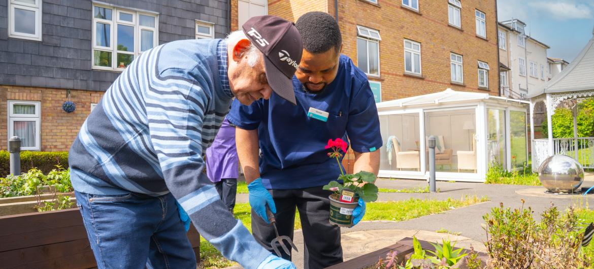 Resident and Carer gardening