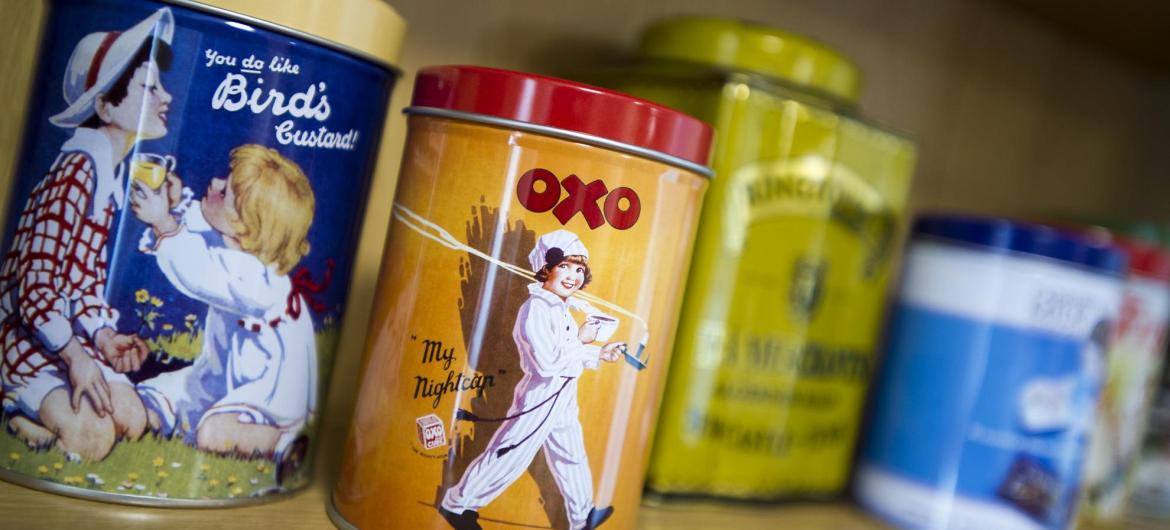 A reminiscence shelf with Birds custard and Oxo tins.