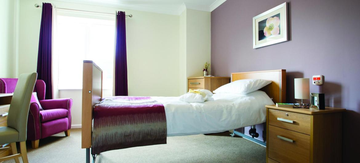 A stylish bedroom in the Juniper House Residential Care Home.