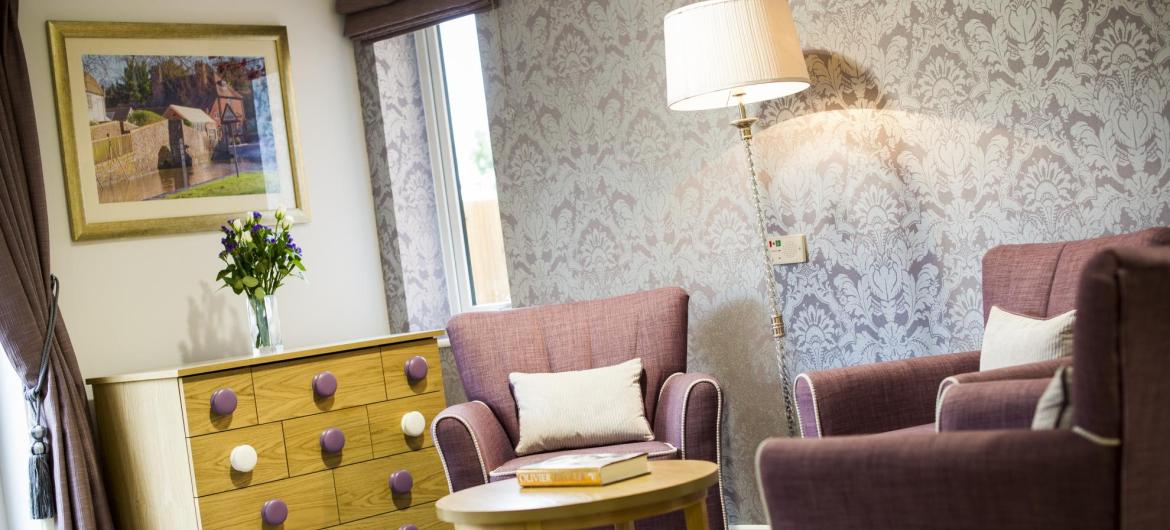 A cosy corner in the lounge at Meadow View Residential Care Home.