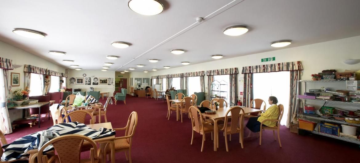 The large and airy dining room at Meadows House Residential and Nursing Home.