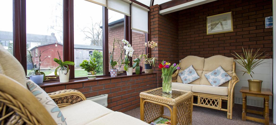 The conservatory at Beechwood Residential Care Home.