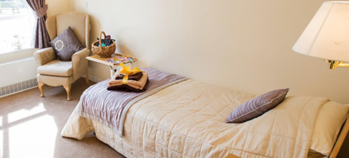 A light and airy bedroom at Breme Residential Care Home.