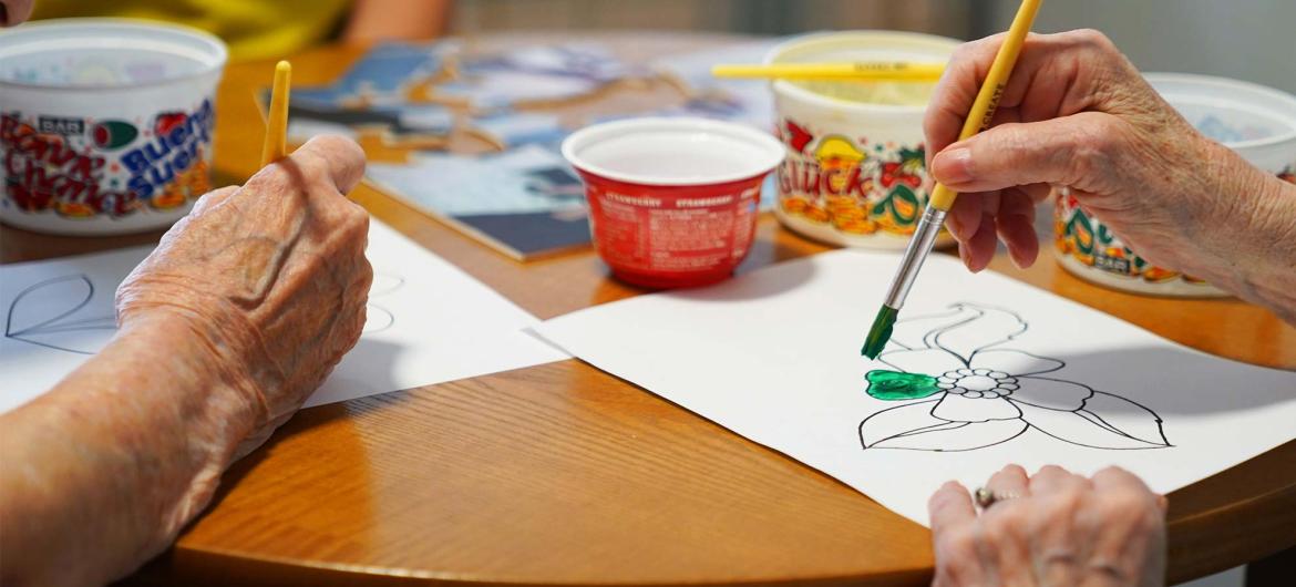 Residents at Brambles Residential Care Home take part in painting activities